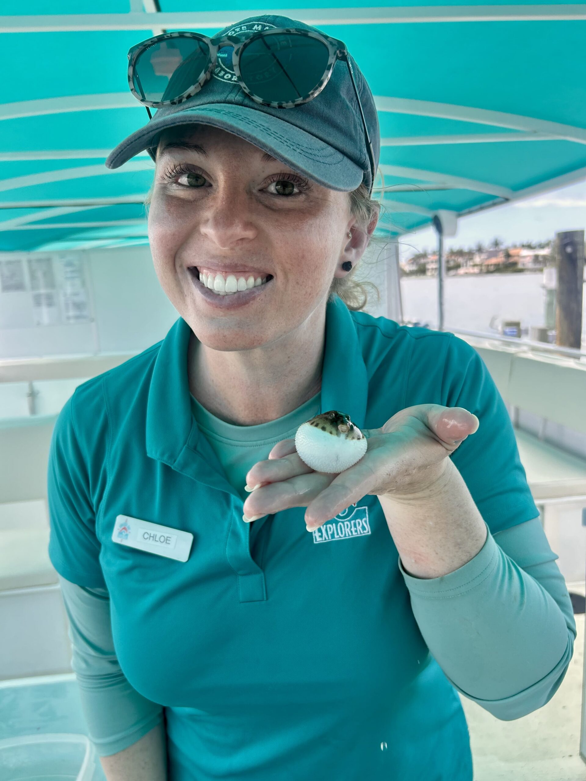 Chloe Bio w puffer (1) Megan, Sarasota Bay Explorers marine biologist