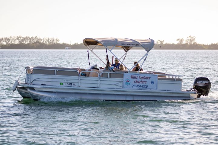 a small boat in a body of water